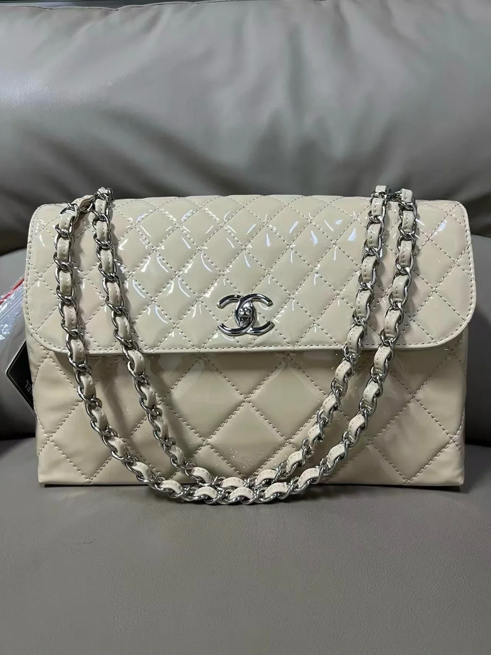 CHANEL Cream Quilted Patent Leather Shoulder Bag with Silver Chain